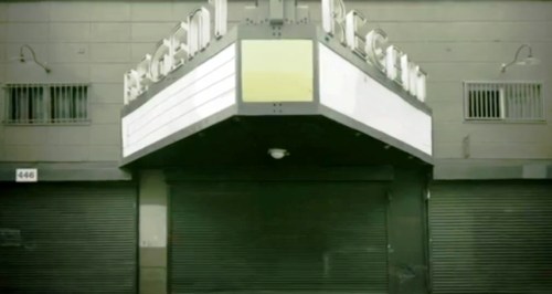 One of the many stills of closed movie theater facades that Paul Schrader scatters throughout 'The Canyons'.