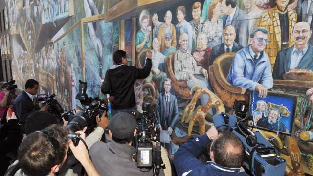 Painting over Jerry Sandusky at the Penn State mural in 'Happy Valley' (Music Box Films)
