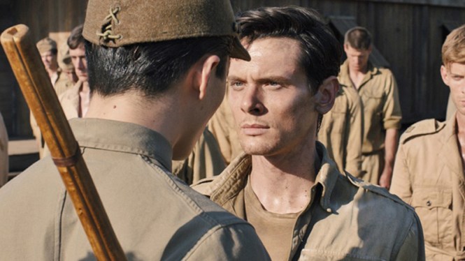 Jack O'Connell faces down a sadistic prison guard in 'Unbroken' (Universal Pictures)